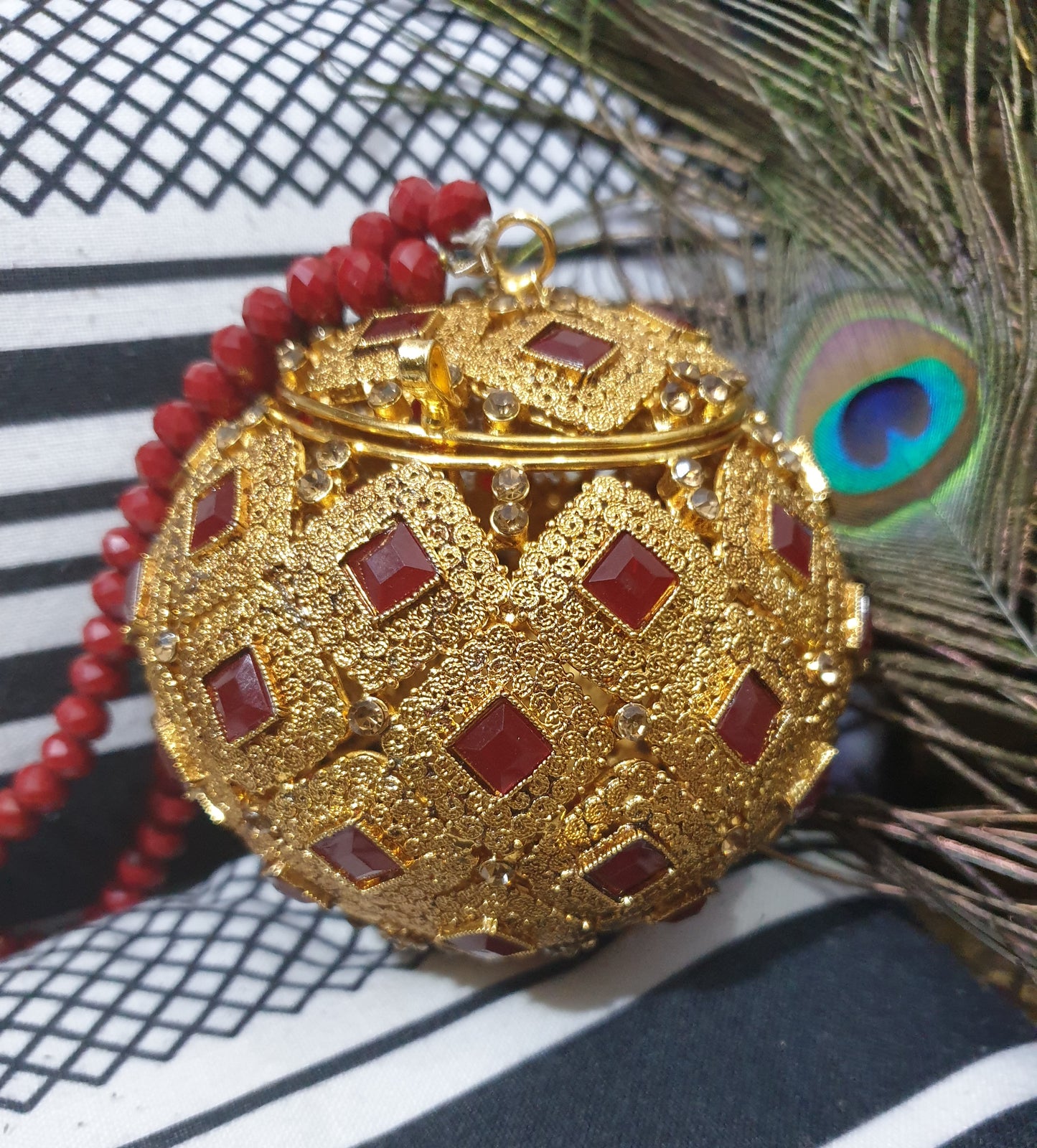 Handmade gold color,  round shaped metal Clutch