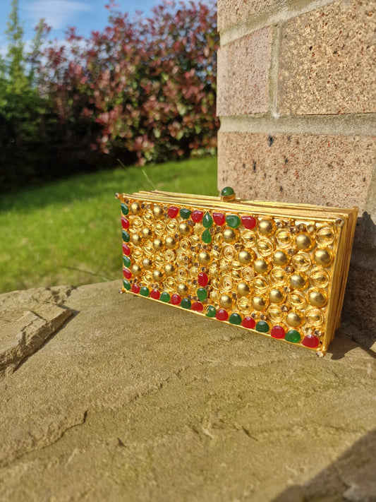 Handcrafted rectangular clutch with Ruby and Emerald color Stones